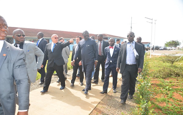 Escorting President Weah on campus visit